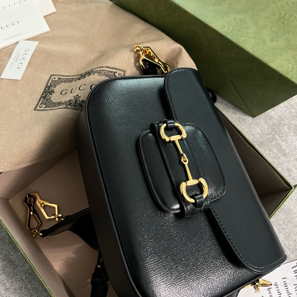 Gucci Horsebit 1955 Mini Bag add a hybrid twist to the vintage inspirées line.
